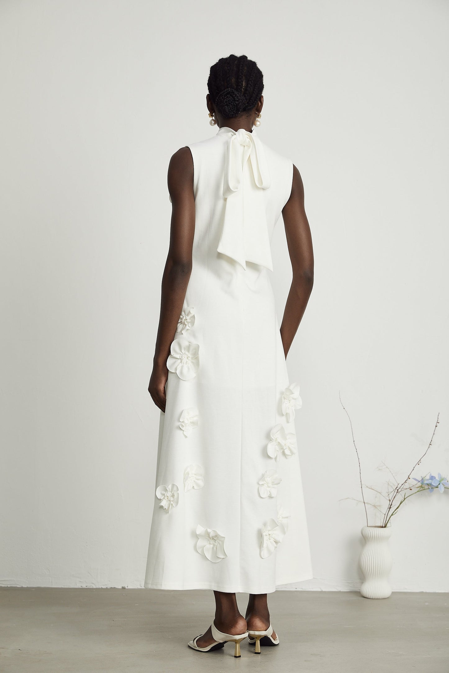 Magali™ | bow-tie faux-flower embellished sleeveless maxi dress in White